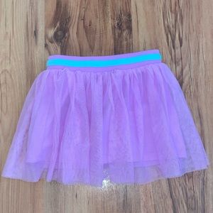 Purple skirt with shorts underneath